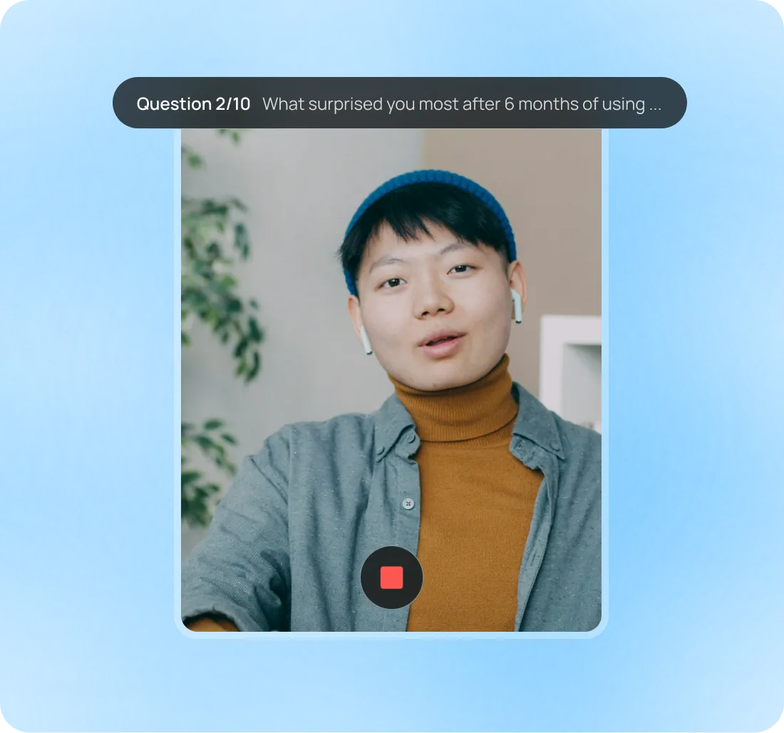 Person recording a video interview with AI-powered question prompts